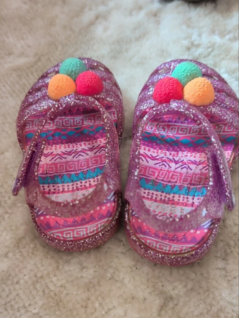 Toddler Glitter Jelly Sandals with Colorful Pom Accents - Pink Crocs